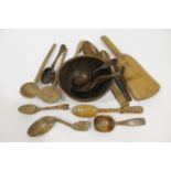 TREEN Twelve various spoons, a scoop and a turned beech bowl 16 cm dia