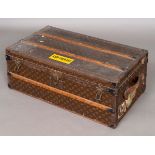 VINTAGE LOUIS VUITTON STEAMER TRUNK an early 20thc steamer trunk, the monogrammed case with wooden