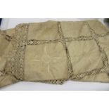 20OTHC EMBROIDERED BED COVER an early 20thc cream embroidered patchwork linen and crochet lace bed