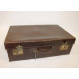 CROCODILE SKIN FITTED SUITCASE a crocodile skin suitcase with a fitted interior, containing a