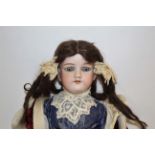 ARMAND MARSEILLE WALKING DOLL - 390 with fixed blue eyes and open mouth, with a mechanism to move