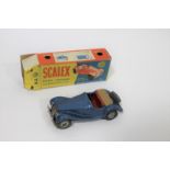 SCALEX M.G - BOXED a circa 1950's M.G TF boxed keyless clockwork model car.