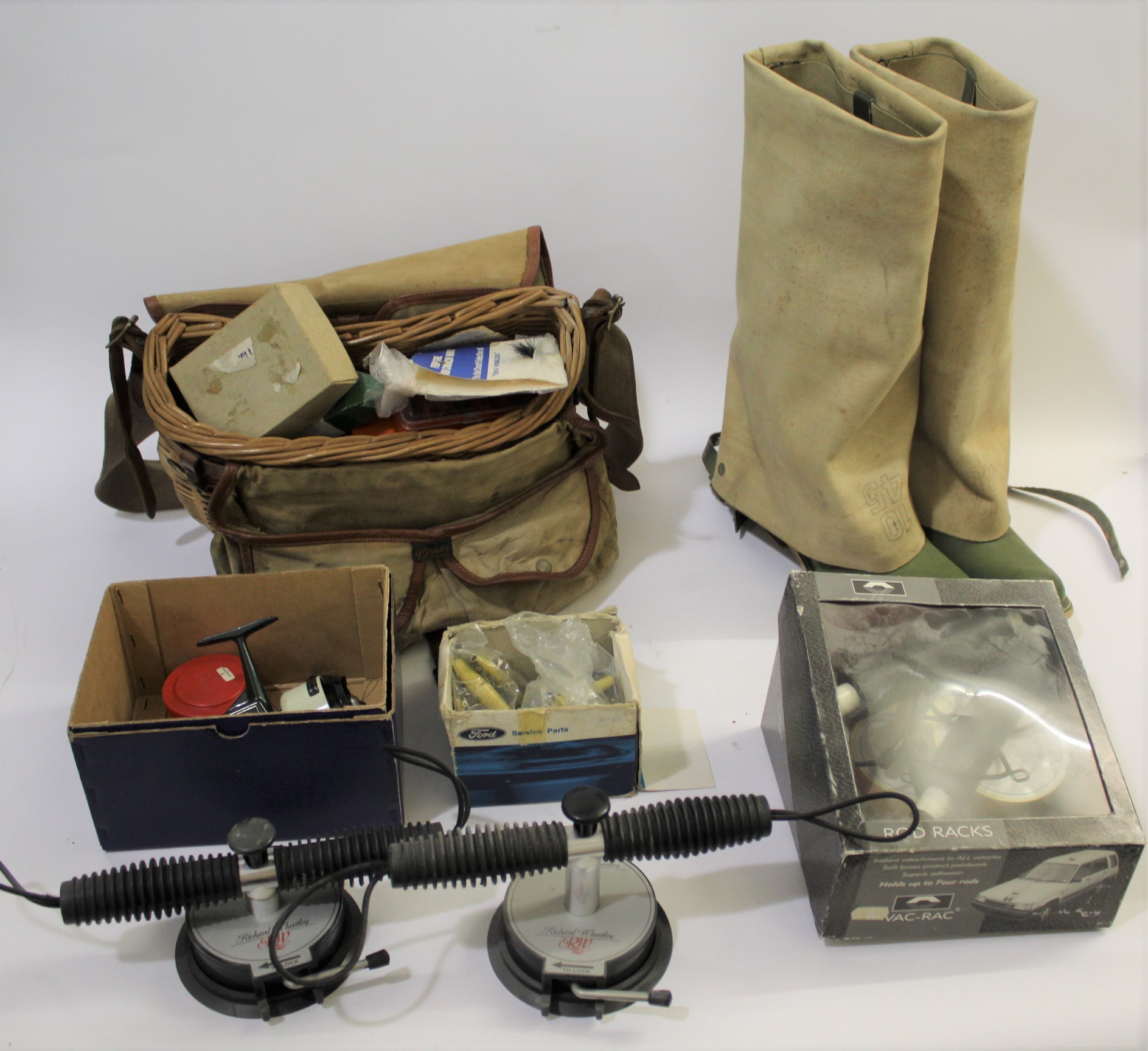 FISHING ACCESSORIES including a pair of waders (size 10), a wicker and canvas fishing basket