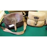 LEATHER CARTRIDGE BAGS 2 leather cartridge bags or satchels, both with long carrying straps. One bag