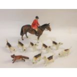 BESWICK HUNTING SET including a Beswick Huntsman on a brown Horse, Model No 1484. Also with 8