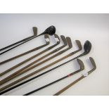 VINTAGE GOLF CLUBS 10 various vintage golf clubs, some with hickory handles. Including examples by D