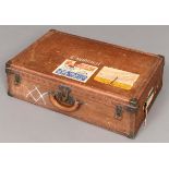 VINTAGE LOUIS VUITTON SUITCASE an early 20thc suitcase, the plain case with leather trim and brass