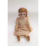 SIMON & HALBIG FOR KAMMER & REINHARDT DOLL the doll with weighted brown eyes and open mouth.