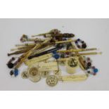 LACE BOBBINS A group of thirteen bone bobbins, another in wood dated 1806 , two spools, one