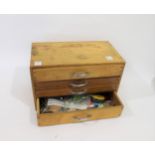 FLY TYING ITEMS & ACCESSORIES a wooden 4 drawer cabinet containing a variety of fishing accessories,