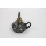 CAST IRON LAMP - A C WELLS a cast iron table lamp with brass top, stamped A C Wells & Co Patent.