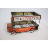 GUINNESS OMNIBUS a tin plate advertising bottle rack in the form of an Omnibus, circa 1960's. Also