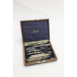 CASED GEOMETRY SET - STANLEY an oak case with a fitted interior and a variety of geometry