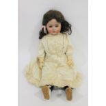 SIMON & HALBIG FOR KAMMER & REINHARDT - 403 a large doll with weighted brown eyes, open mouth with