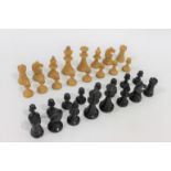 WOODEN CHESS SET a boxwood and ebony chess set, unmarked with some damages in places. King 8.5cms