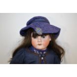LARGE MAX HANDWERCK DOLL a large doll with weighted blue eyes and open mouth. Impressed marks, Max