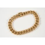 A GOLD CURB LINK BRACELET with French marks to the clasp, concealed clasp, 18cm. long, 13.9 grams,