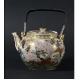 JAPANESE SATSUMA TEAPOT AND COVER, circa 1900, decorated with numerous butterflies and chrysanthemum