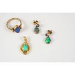 A PAIR OF BLACK OPAL DROP EARRINGS each set with an oval-shaped solid black opal in gold, 2cm. long,