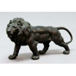 JAPANESE BRONZE LION, first half 20th century, standing looking to the left, three character