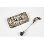 A MARCASITE AND PASTE SET OPENWORK FOLIATE BROOCH of rectangular-shape, 6.5cm. wide, together with a