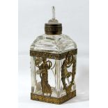 FRENCH GLASS AND GILT METAL MOUNTED SCENT BOTTLE AND STOPPERS, late 19th century, of square section,