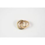 AN 18CT. THREE COLOUR GOLD TRIPLE BAND RING 12.7 grams. Size K.