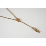 A 9CT. GOLD WATCH CHAIN the fancy link watch chain suspends a gold tassel pendant, with shield