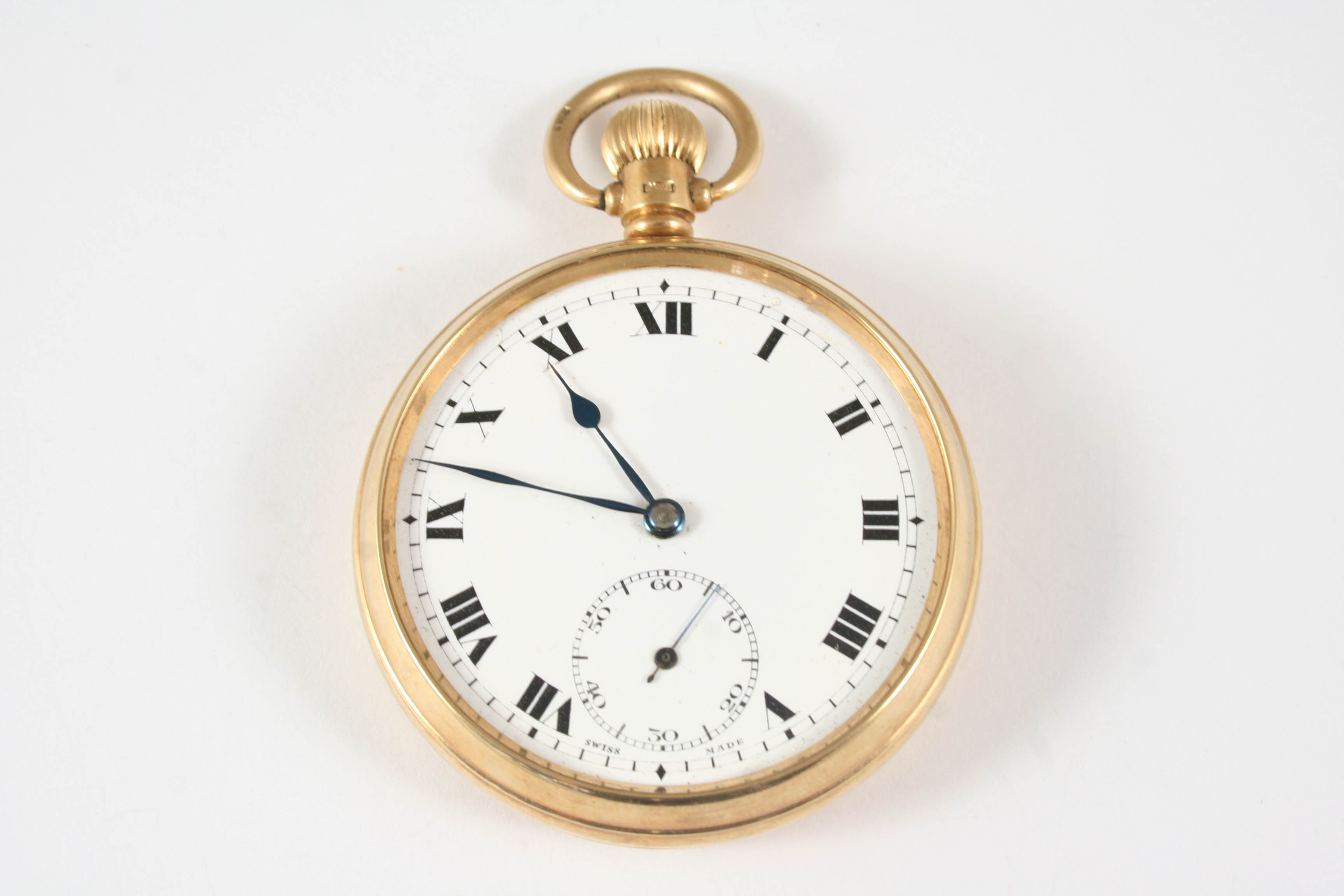 A 9CT. GOLD OPEN FACED POCKET WATCH the white enamel dial with Roman numerals and subsidiary seconds