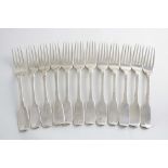 A SET OF TWELVE GEORGE IV IRISH FIDDLE PATTERN DESSERT FORKS by James Brady, (Retailer's mark of "