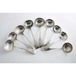 NINE VARIOUS IRISH SAUCE LADLES Fiddle rattail pattern, most pieces crested, mixed makers & dates,