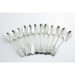 A SET OF TWELVE GEORGE III IRISH FIDDLE PATTERN TEA SPOONS crested and initialled, by either John