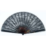 DUVELLEROY:- A fan with tortoiseshell guards & sticks and black lace leaves of floral design, late