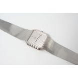 A GENTLEMAN'S 18CT. WHITE GOLD AUTOMATIC WRISTWATCH BY OMEGA the signed cut cornered square-shaped