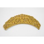 A GILT METAL TIARA of openwork foliate design, 19cm. wide.