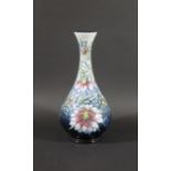 MOORCROFT VASE - LOVE IN A MIST a modern Moorcroft vase in the Love in a mist design, designed by