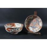 GRADUATED PAIR OF JAPANESE BOWLS, late 19th century, enamelled with fans, scrolling foliage and