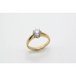 A DIAMOND SOLITAIRE RING the round brilliant-cut diamond weighs approximately 0.90 carats and is set