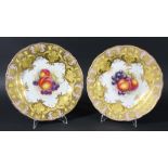 PAIR OF ROYAL WORCESTER PLATES, date code for 1957, by J Freeman, painted with fruit inside a yellow