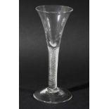 GEORGIAN WINE GLASS, the trumpet shaped bowl above a multiple spiral air twist stem and spreading