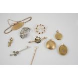 A QUANTITY OF JEWELLERY including a garnet and cultured pearl circle brooch, an enamel and 9ct. gold