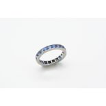 A SAPPHIRE FULL CIRCLE ETERNITY RING set with rectangular-shaped calibre-cut sapphires. Size M.