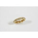 A DIAMOND FULL CIRCLE ETERNITY RING BY VAN CLEEF & ARPELS mounted with two rows of circular-cut