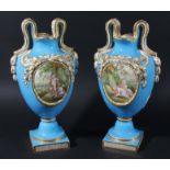PAIR OF COALPORT VASES, painted in the Sevres style with cherub and floral panels in moulded