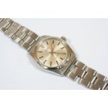 A GENTLEMAN'S STAINLESS STEEL OYSTER WRISTWATCH BY TUDOR ROLEX the signed circular dial with baton