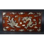 CHINESE HARDWOOD AND MOTHER OF PEARL INLAID STAND, decorated with a dragon and phoenix around a