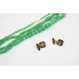 A SINGLE ROW GRADUATED JADE BEAD NECKLACE the jade beads graduate from approximately 3.8 to 11.7mm.,