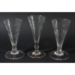 PAIR OF ENGLISH GLASSES, mid 18th century, the conical bowl with wrythen base and stem on