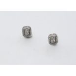 A PAIR OF DIAMOND CLUSTER STUD EARRINGS of rectangular form, each set with small circular-cut