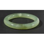 CHINESE GREEN 'JADE' BANGLE, diameter 8.5cm